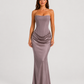 Women's strapless satin gown featuring a draped waist, sculpted fitted silhouette, and elegant floor-length design in a lustrous satin finish.