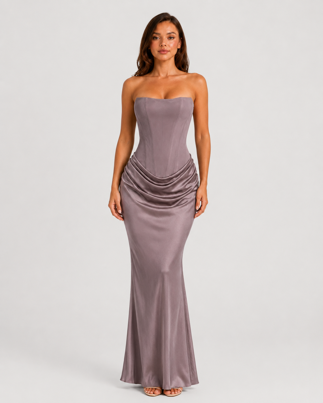 Women's strapless satin gown featuring a draped waist, sculpted fitted silhouette, and elegant floor-length design in a lustrous satin finish.