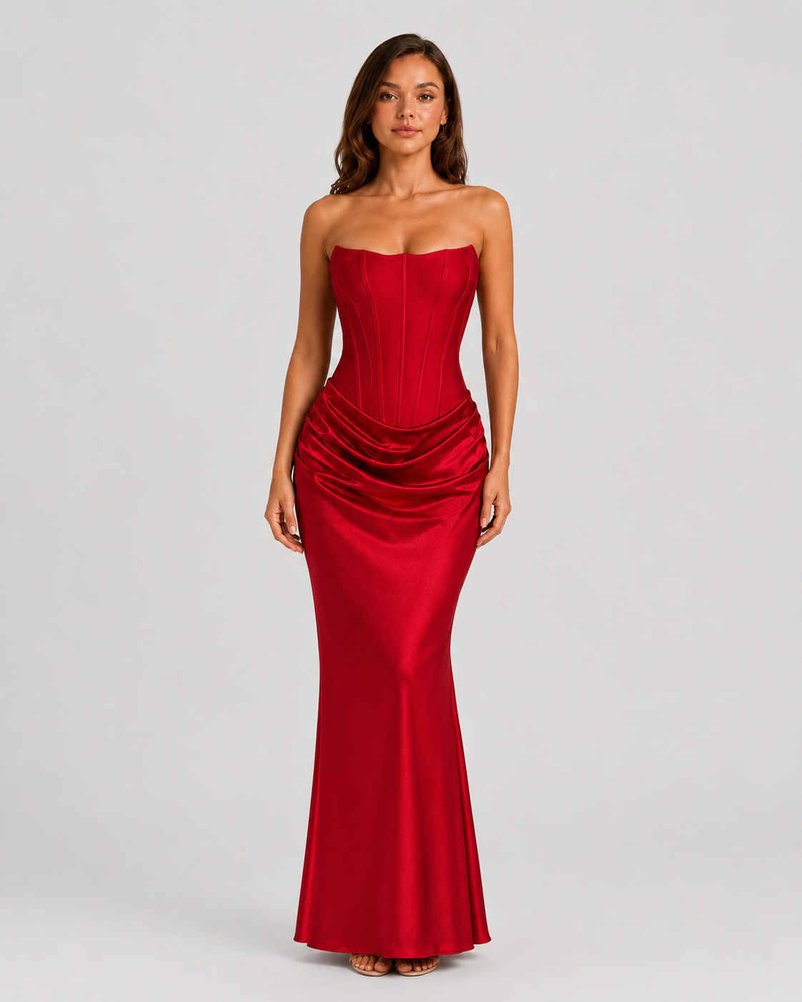 Women's strapless satin gown featuring a draped waist, sculpted fitted silhouette, and elegant floor-length design in a lustrous satin finish.