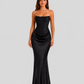 Women's strapless satin gown featuring a draped waist, sculpted fitted silhouette, and elegant floor-length design in a lustrous satin finish.