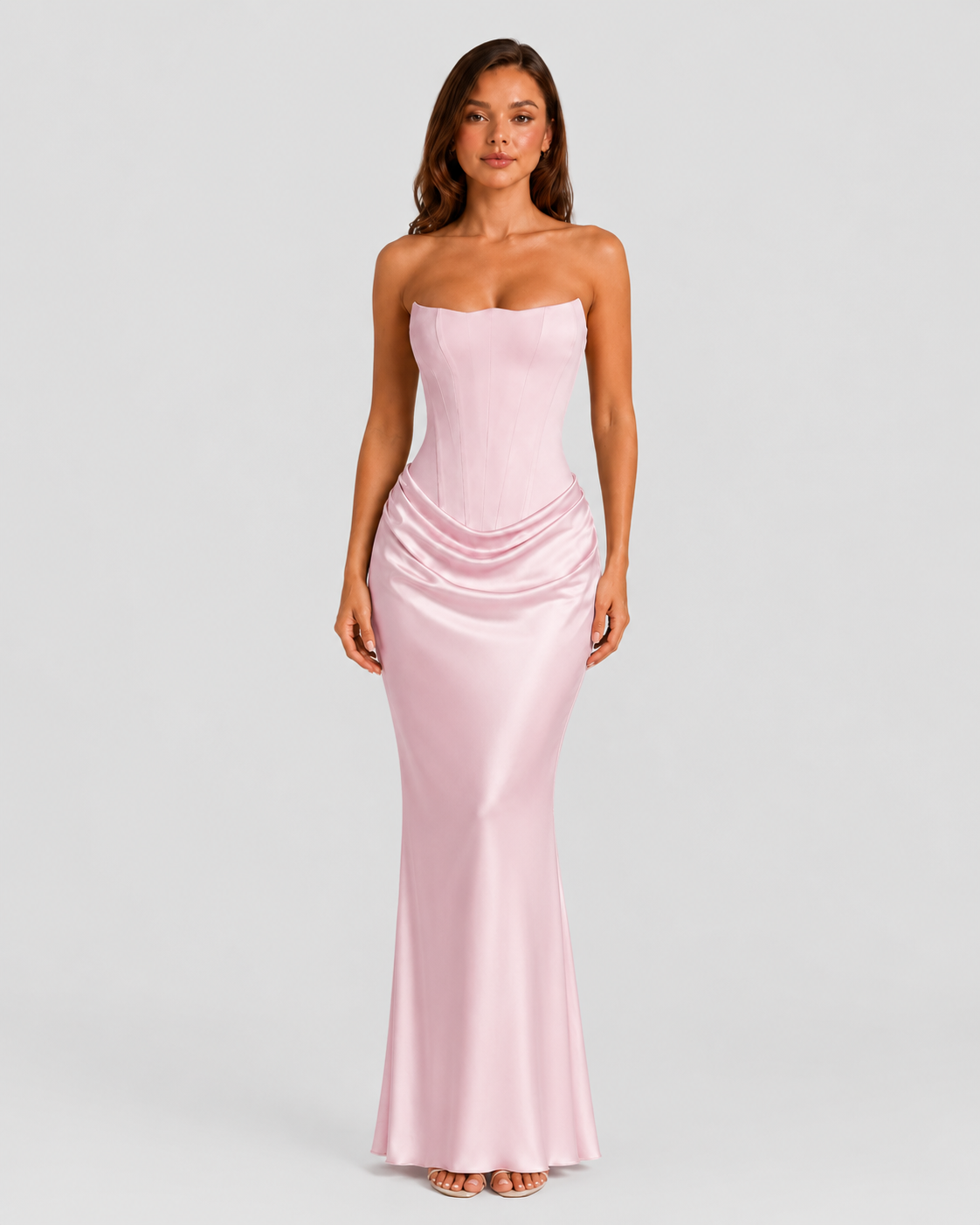 Women's strapless satin gown featuring a draped waist, sculpted fitted silhouette, and elegant floor-length design in a lustrous satin finish.