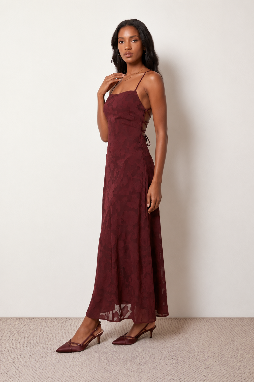 Women's Selene floral jacquard maxi dress featuring a square neckline, cross-back spaghetti straps, adjustable lace-up corset back, flowing A-line silhouette and floor-length hem, ideal for weddings, proms and formal occasions.
