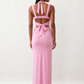 Woman wearing the Skye Open Back Fitted Maxi Dress featuring a square neckline, wide shoulder straps, ruched bodycon silhouette, open back with a smocked panel and tie-bow fastening, thigh-high side split, and floor-length maxi design, perfect for weddings, cocktail parties and formal occasions.