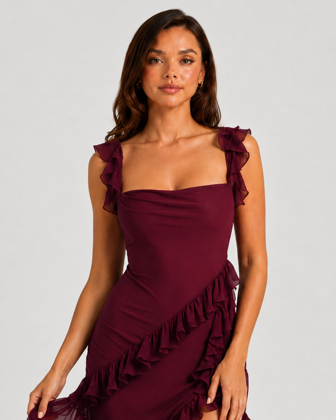 Women's elegant summer occasion dress with sculpted fit, flowing skirt, and sophisticated split detail for refined event styling.