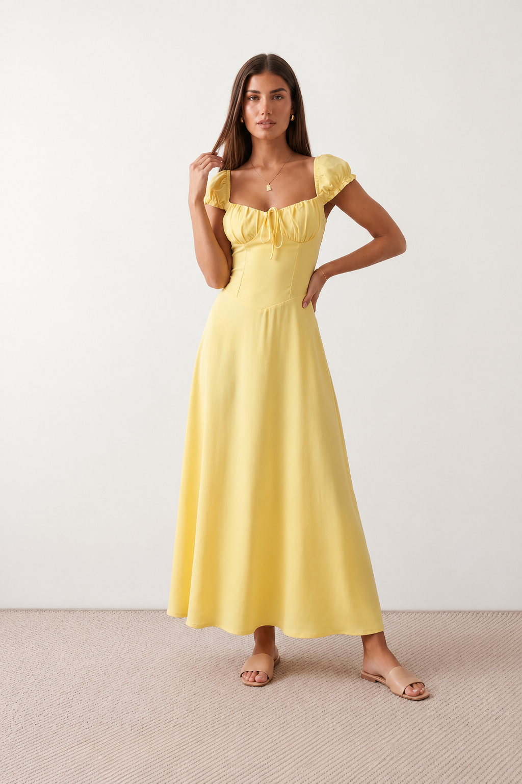 Halle sweetheart low back maxi dress with a structured corset bodice, tie-front bust detail, sweetheart neckline, low open back, and flowing A-line maxi skirt with a floor-length hem.