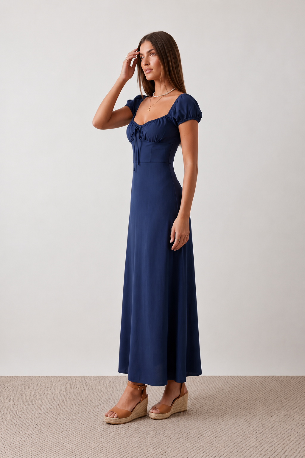 Halle sweetheart low back maxi dress with a structured corset bodice, tie-front bust detail, sweetheart neckline, low open back, and flowing A-line maxi skirt with a floor-length hem.