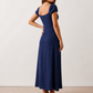 Halle sweetheart low back maxi dress with a structured corset bodice, tie-front bust detail, sweetheart neckline, low open back, and flowing A-line maxi skirt with a floor-length hem.