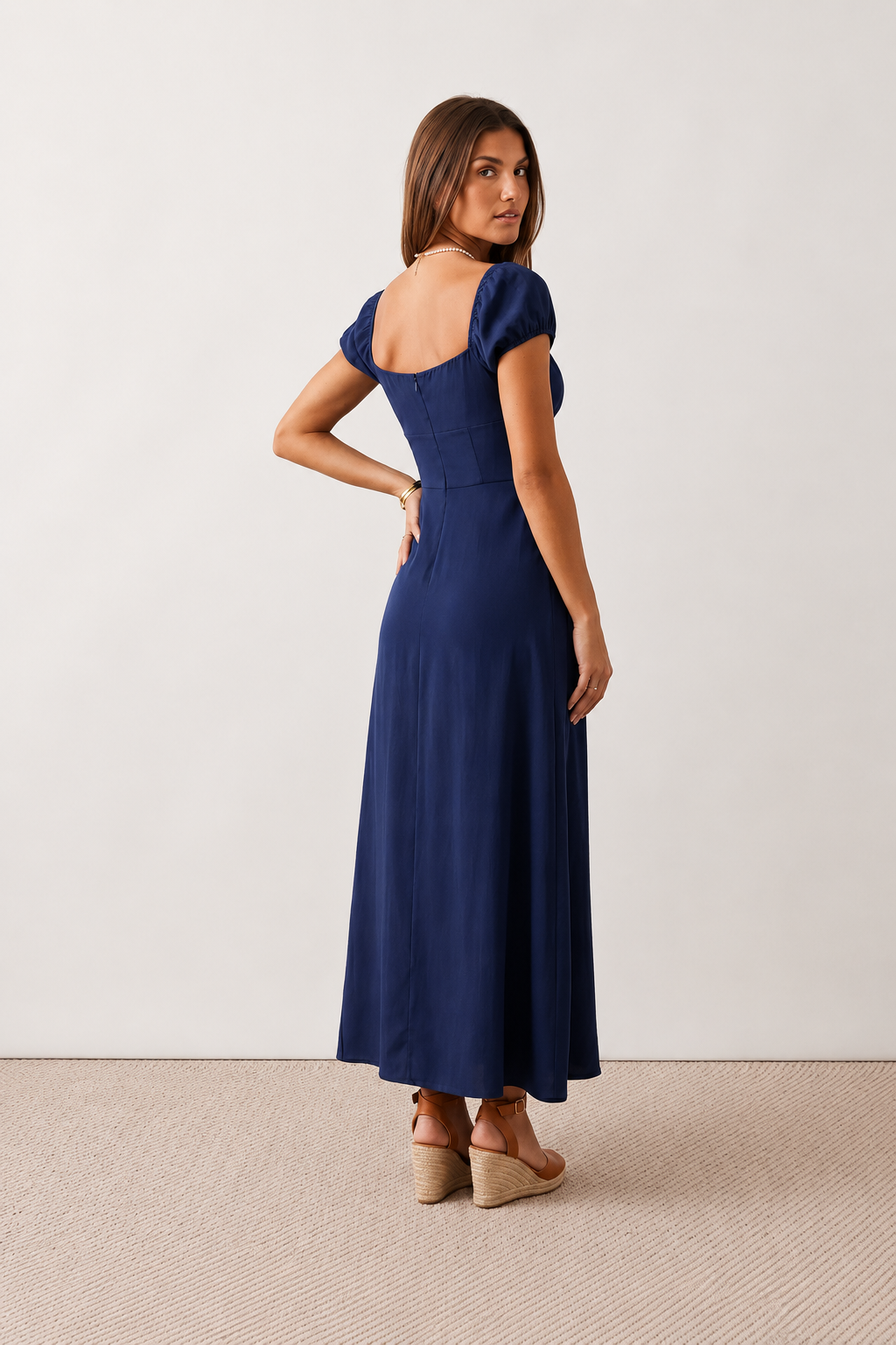 Halle sweetheart low back maxi dress with a structured corset bodice, tie-front bust detail, sweetheart neckline, low open back, and flowing A-line maxi skirt with a floor-length hem.