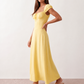 Halle sweetheart low back maxi dress with a structured corset bodice, tie-front bust detail, sweetheart neckline, low open back, and flowing A-line maxi skirt with a floor-length hem.