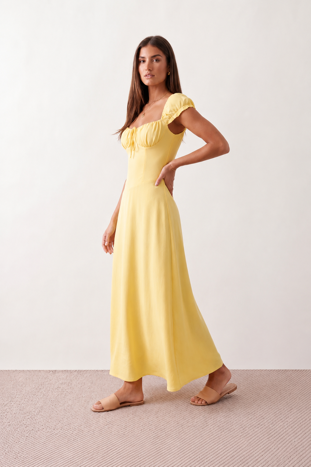 Halle sweetheart low back maxi dress with a structured corset bodice, tie-front bust detail, sweetheart neckline, low open back, and flowing A-line maxi skirt with a floor-length hem.