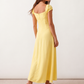 Halle sweetheart low back maxi dress with a structured corset bodice, tie-front bust detail, sweetheart neckline, low open back, and flowing A-line maxi skirt with a floor-length hem.