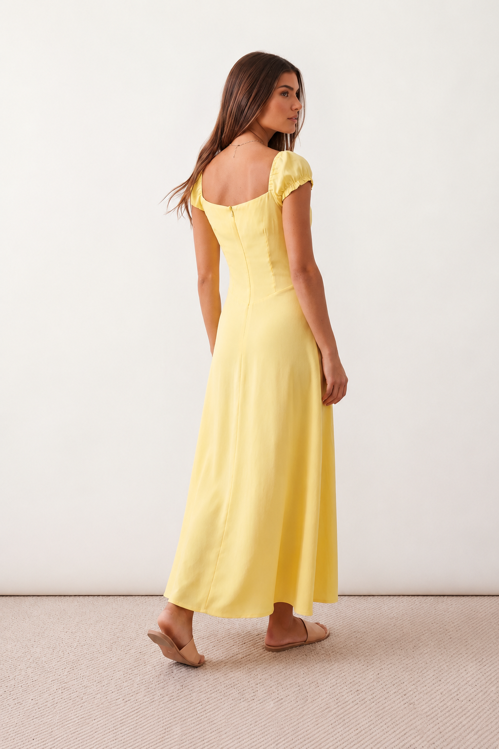 Halle sweetheart low back maxi dress with a structured corset bodice, tie-front bust detail, sweetheart neckline, low open back, and flowing A-line maxi skirt with a floor-length hem.