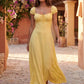 Halle sweetheart low back maxi dress with a structured corset bodice, tie-front bust detail, sweetheart neckline, low open back, and flowing A-line maxi skirt with a floor-length hem.