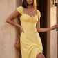 Halle sweetheart low back maxi dress with a structured corset bodice, tie-front bust detail, sweetheart neckline, low open back, and flowing A-line maxi skirt with a floor-length hem.