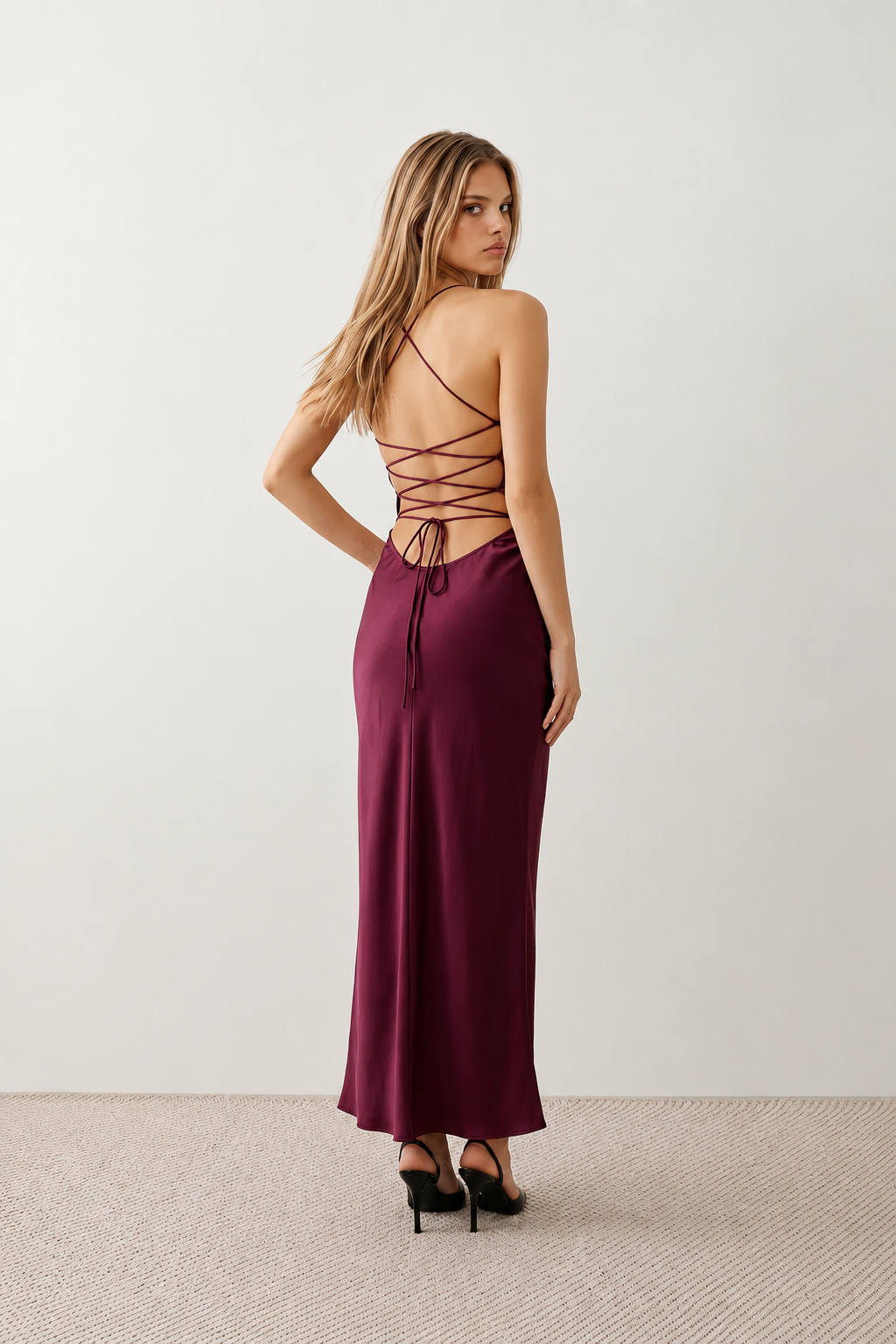 Women's Sylvie sequined slip maxi dress featuring a sparkling sweetheart bodice with ruched twist detail, adjustable halter tie neckline, lace-up open back, satin floor-length skirt with a side split, perfect for weddings, black-tie events and formal evening occasions.