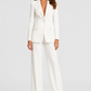 Women's tailored blazer and wide-leg trouser co-ord set featuring a structured notched lapel blazer and fluid wide-leg trousers in a refined neutral tone.