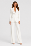 Women's tailored blazer and wide-leg trouser co-ord set featuring a structured notched lapel blazer and fluid wide-leg trousers in a refined neutral tone.
