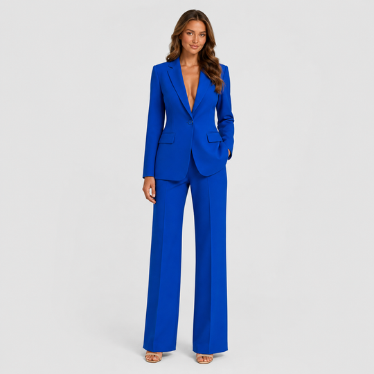 Women's tailored blazer and wide-leg trouser co-ord set featuring a structured notched lapel blazer and fluid wide-leg trousers in a refined neutral tone.