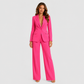 Women's tailored blazer and wide-leg trouser co-ord set featuring a structured notched lapel blazer and fluid wide-leg trousers in a refined neutral tone.