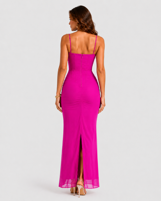 Woman wearing a fitted lace mesh corset dress with underwired cups, delicate lace trim, and a body-contouring silhouette designed for elegant evening occasions.