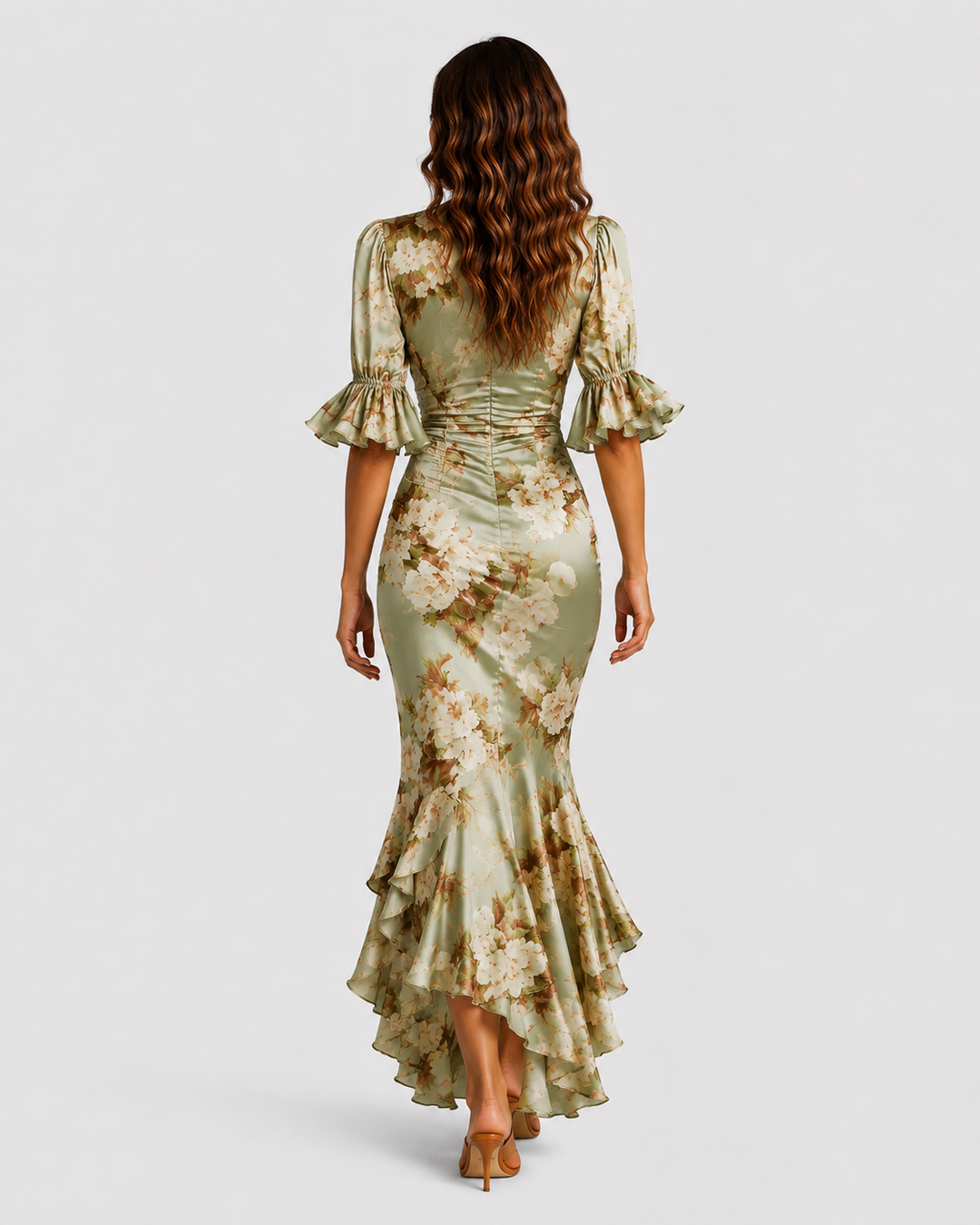 Women's floral satin-feel maxi dress with ruched waist, deep V-neckline, flutter sleeves, and flowing asymmetric hem.