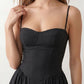 Women's sweetheart corset midi dress featuring a structured corset-inspired bodice, adjustable spaghetti straps, a defined waist, and a softly pleated A-line skirt. An elegant midi dress for weddings, cocktail parties, race days, and formal occasions.
