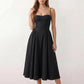Women's sweetheart corset midi dress featuring a structured corset-inspired bodice, adjustable spaghetti straps, a defined waist, and a softly pleated A-line skirt. An elegant midi dress for weddings, cocktail parties, race days, and formal occasions.