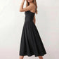 Women's sweetheart corset midi dress featuring a structured corset-inspired bodice, adjustable spaghetti straps, a defined waist, and a softly pleated A-line skirt. An elegant midi dress for weddings, cocktail parties, race days, and formal occasions.