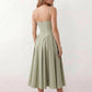 Women's sweetheart corset midi dress featuring a structured corset-inspired bodice, adjustable spaghetti straps, a defined waist, and a softly pleated A-line skirt. An elegant midi dress for weddings, cocktail parties, race days, and formal occasions.
