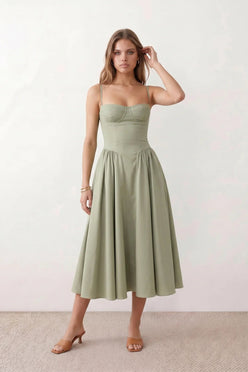 Women's sweetheart corset midi dress featuring a structured corset-inspired bodice, adjustable spaghetti straps, a defined waist, and a softly pleated A-line skirt. An elegant midi dress for weddings, cocktail parties, race days, and formal occasions.