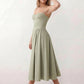 Women's sweetheart corset midi dress featuring a structured corset-inspired bodice, adjustable spaghetti straps, a defined waist, and a softly pleated A-line skirt. An elegant midi dress for weddings, cocktail parties, race days, and formal occasions.