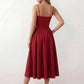 Women's sweetheart corset midi dress featuring a structured corset-inspired bodice, adjustable spaghetti straps, a defined waist, and a softly pleated A-line skirt. An elegant midi dress for weddings, cocktail parties, race days, and formal occasions.