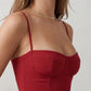 Women's sweetheart corset midi dress featuring a structured corset-inspired bodice, adjustable spaghetti straps, a defined waist, and a softly pleated A-line skirt. An elegant midi dress for weddings, cocktail parties, race days, and formal occasions.
