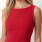 Maraea fitted sleeveless mini dress with a boat neckline, structured sheath silhouette, smooth finish, straight mini hem, and center back zip closure.