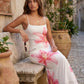Women's floral slip maxi dress with a square neckline, delicate spaghetti straps, and a body-skimming silhouette featuring an all-over floral print on a sheer mesh overlay, ideal for weddings, summer occasions, and elegant evening wear.