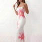 Women's floral slip maxi dress with a square neckline, delicate spaghetti straps, and a body-skimming silhouette featuring an all-over floral print on a sheer mesh overlay, ideal for weddings, summer occasions, and elegant evening wear.