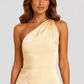 Woman wearing a soft beige asymmetric maxi dress with a one-shoulder neckline, fitted bodice, elegant draped silhouette and thigh-high side split, styled for weddings, evening events and formal occasions.