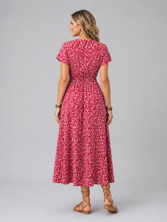 Women’s floral midi dress with butterfly sleeves, slit detail, and flowing silhouette