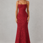 Women’s floral jacquard maxi dress featuring a draped cowl neckline, adjustable tie straps, and a flowing bias-cut silhouette for weddings and formal occasions.
