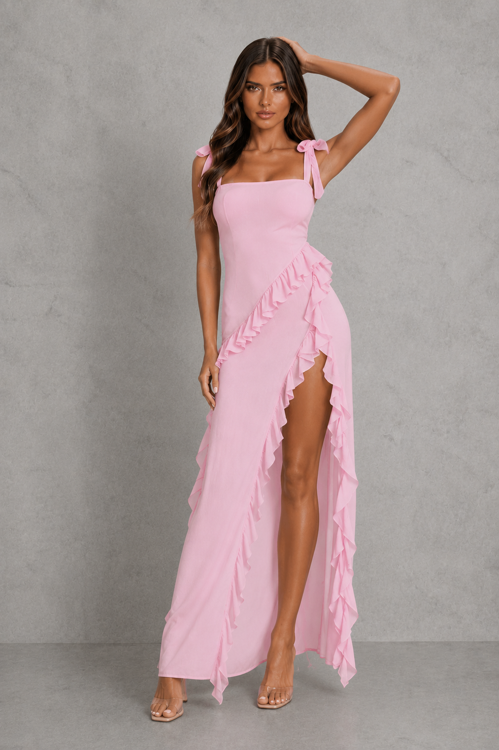 Women’s floral ruched maxi dress featuring rose appliqué accents, cascading asymmetric ruffles, adjustable straps, and a flowing silhouette for weddings and summer occasion wear.