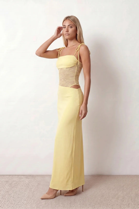 Women’s lace panel maxi dress featuring a square neckline, adjustable spaghetti straps, sheer lace waist, low open back, and floor-length silhouette for evening wear.