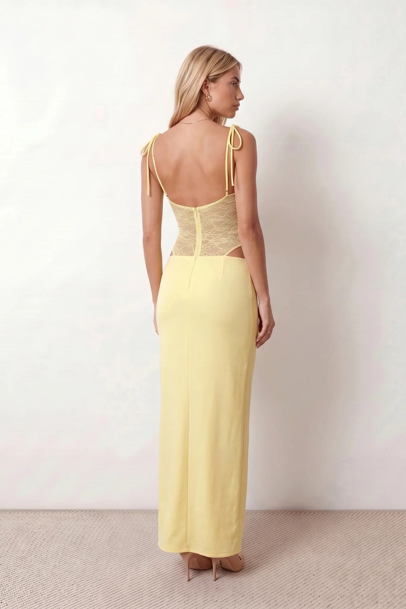 Women’s lace panel maxi dress featuring a square neckline, adjustable spaghetti straps, sheer lace waist, low open back, and floor-length silhouette for evening wear.