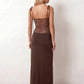 Women’s lace panel maxi dress featuring a square neckline, adjustable spaghetti straps, sheer lace waist, low open back, and floor-length silhouette for evening wear.