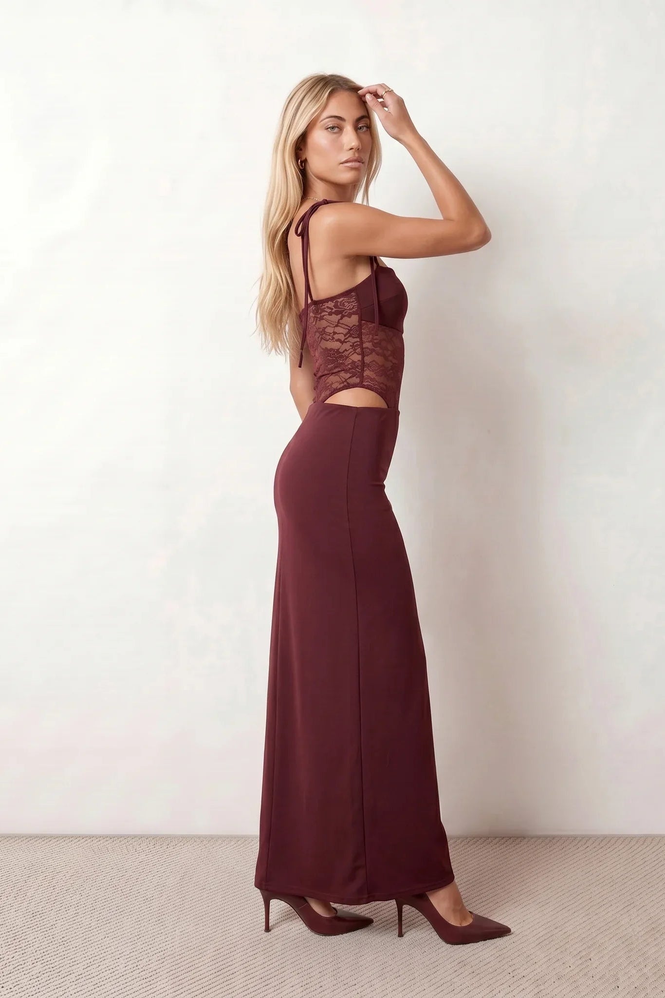 Women’s lace panel maxi dress featuring a square neckline, adjustable spaghetti straps, sheer lace waist, low open back, and floor-length silhouette for evening wear.