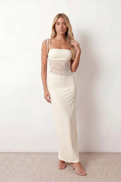 Women’s lace panel maxi dress featuring a square neckline, adjustable spaghetti straps, sheer lace waist, low open back, and floor-length silhouette for evening wear.