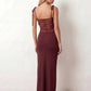Women’s lace panel maxi dress featuring a square neckline, adjustable spaghetti straps, sheer lace waist, low open back, and floor-length silhouette for evening wear.