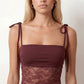 Women’s lace panel maxi dress featuring a square neckline, adjustable spaghetti straps, sheer lace waist, low open back, and floor-length silhouette for evening wear.