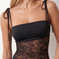 Women’s lace panel maxi dress featuring a square neckline, adjustable spaghetti straps, sheer lace waist, low open back, and floor-length silhouette for evening wear.