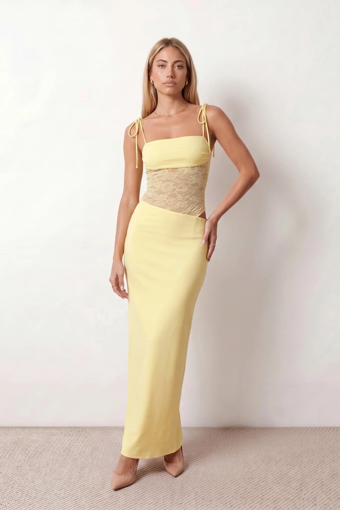 Women’s lace panel maxi dress featuring a square neckline, adjustable spaghetti straps, sheer lace waist, low open back, and floor-length silhouette for evening wear.