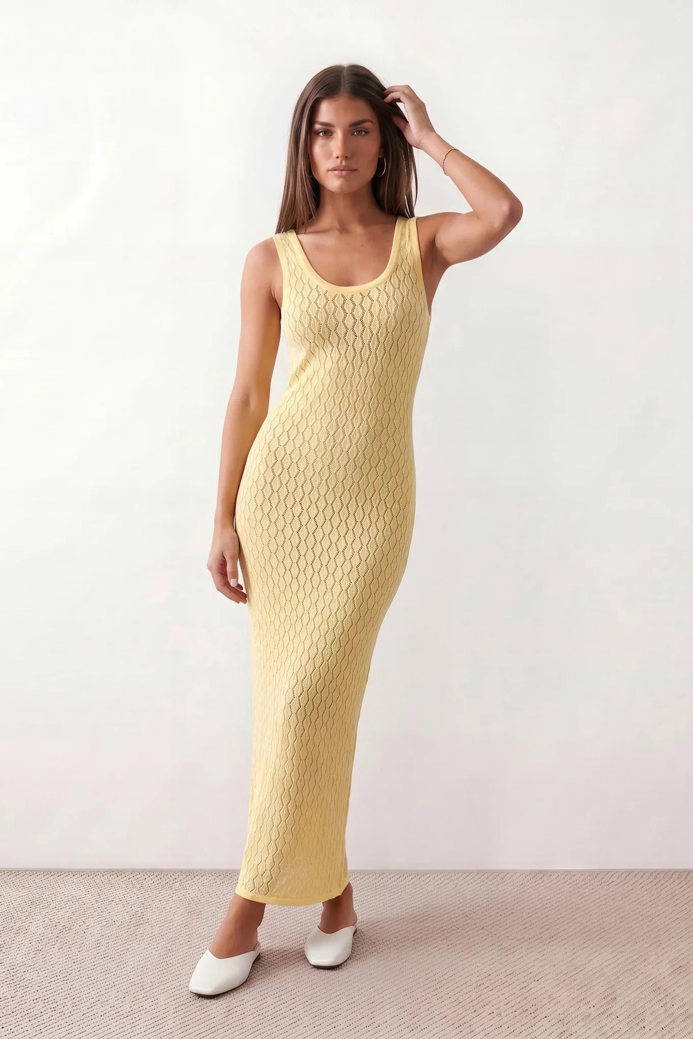 Women’s openwork knit maxi dress with a diamond knit texture, round neckline, wide straps, and sleeveless design for beach and summer wear.